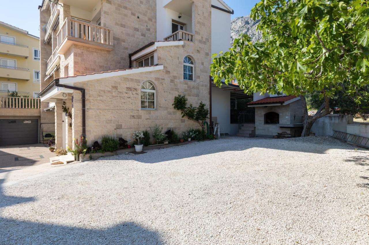Apartment Duce 5973B Omiš Esterno foto